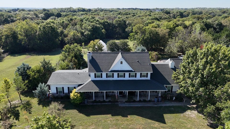 Completed roof by Black Bison Roofing with matched ridge cap